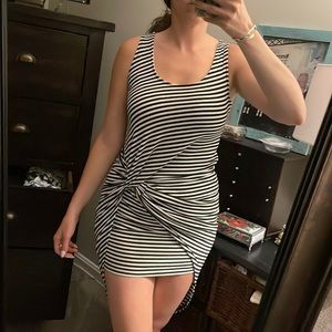 Black and white dress with criss cross front and longer back